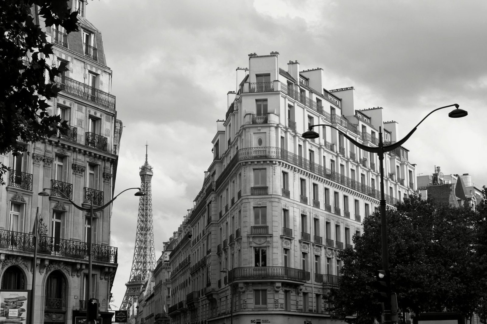 The Story of the Eiffel Tower: From Controversy to the World’s Most Visited Monument 4 Black and white Parisian street with the Eiffel Tower in the background