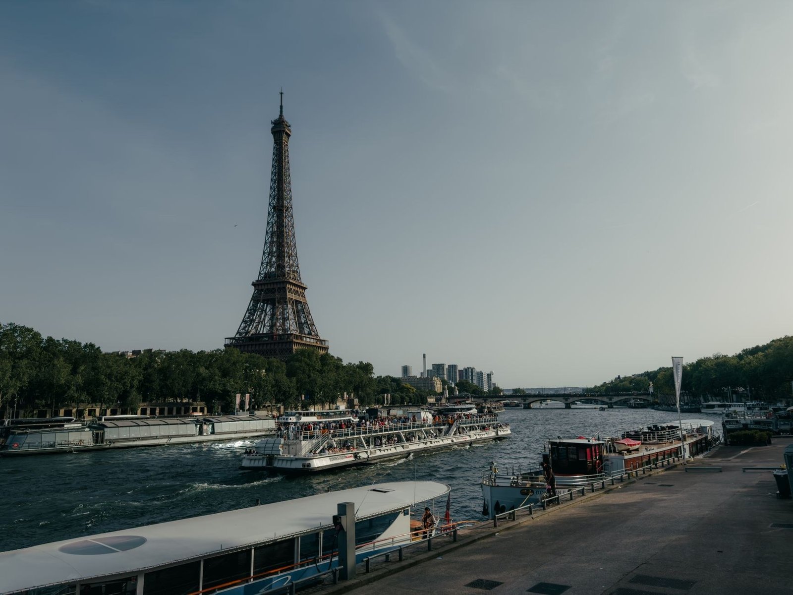 The Eiffel Tower for Free: How to See It Without Buying a Ticket 4 View of the Eiffel Tower over the Seine River in Paris